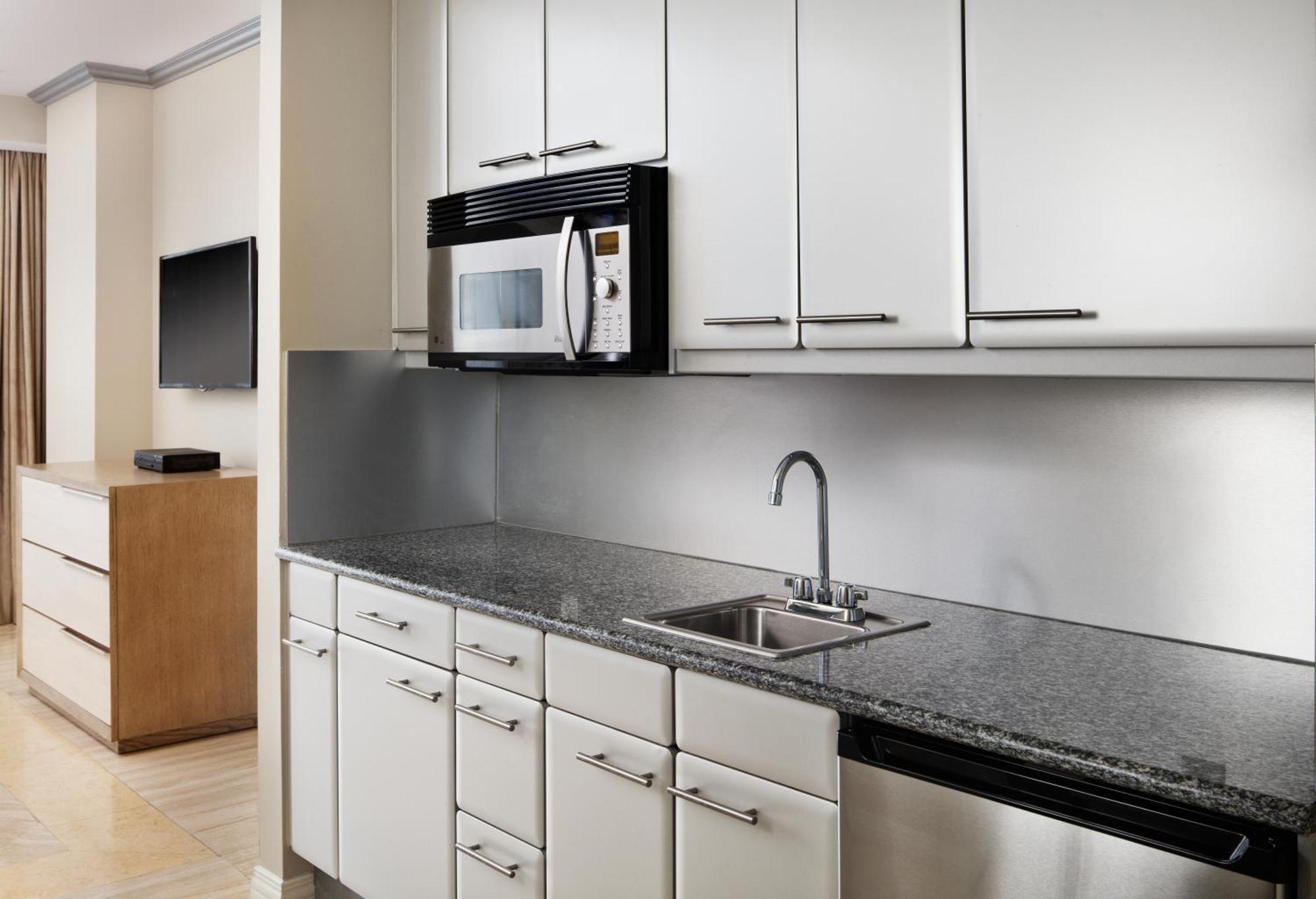 Corner Studio with Two Double Beds and Partial Ocean View