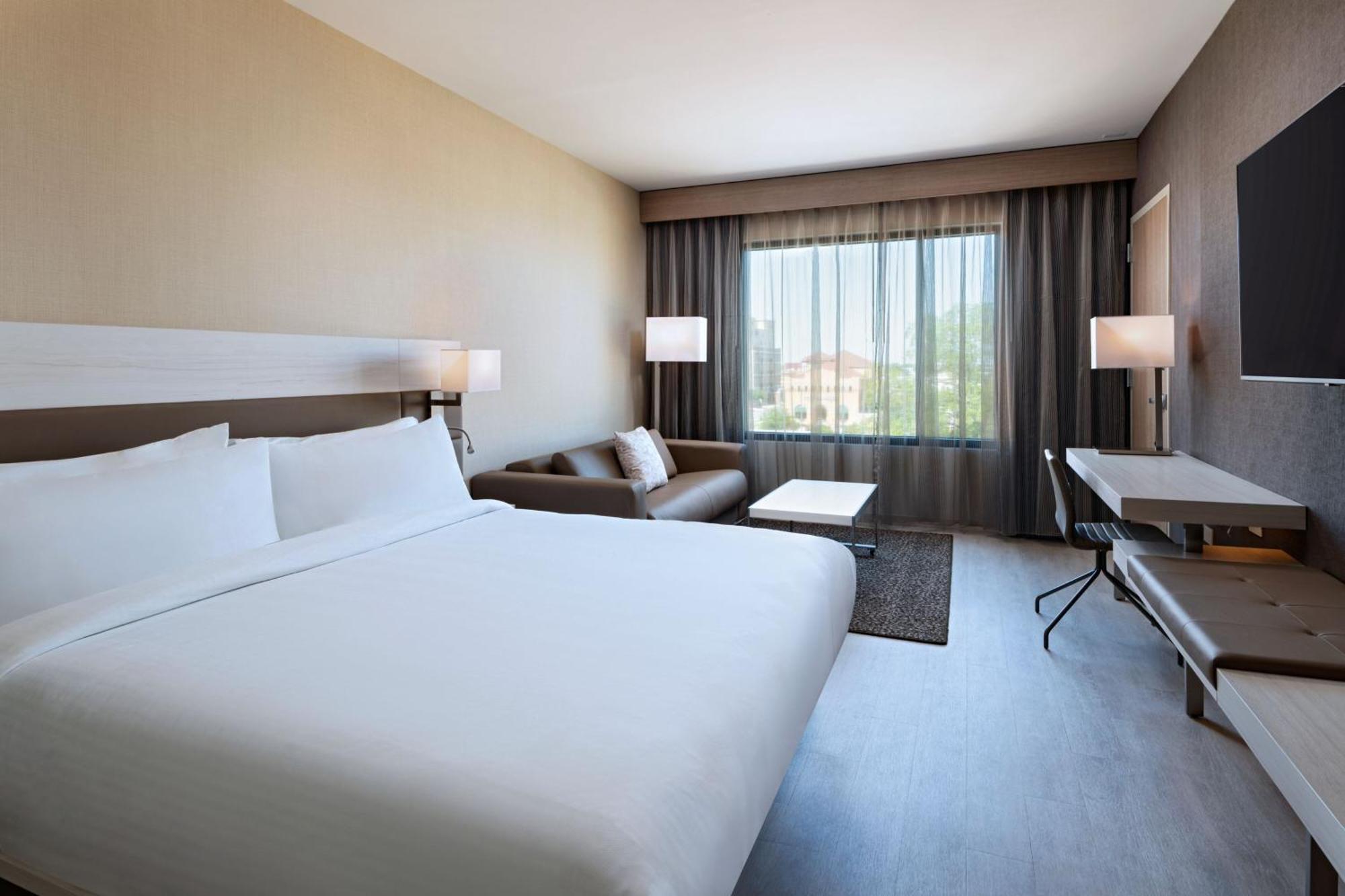 Deluxe King Room Sofa Bed City View